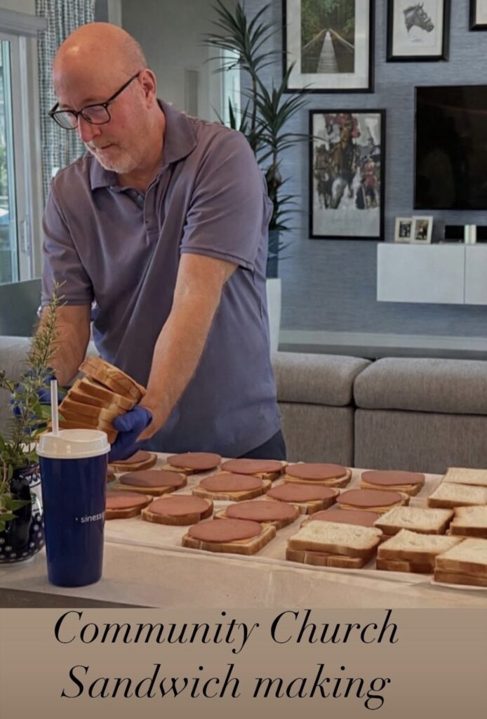 JOHN AND DEBBIANN HABERKERN OF FEVERISH PACE PAINTING helping make sandwiches for the homeless in Fort Myers