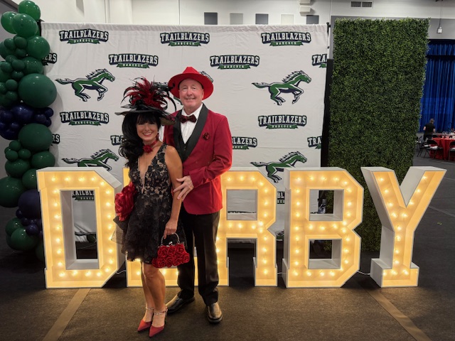 JOHN AND DEBBIANN HABERKERN OF FEVERISH PACE PAINTING supporting the Babcock Schools Annual Derby Gala
